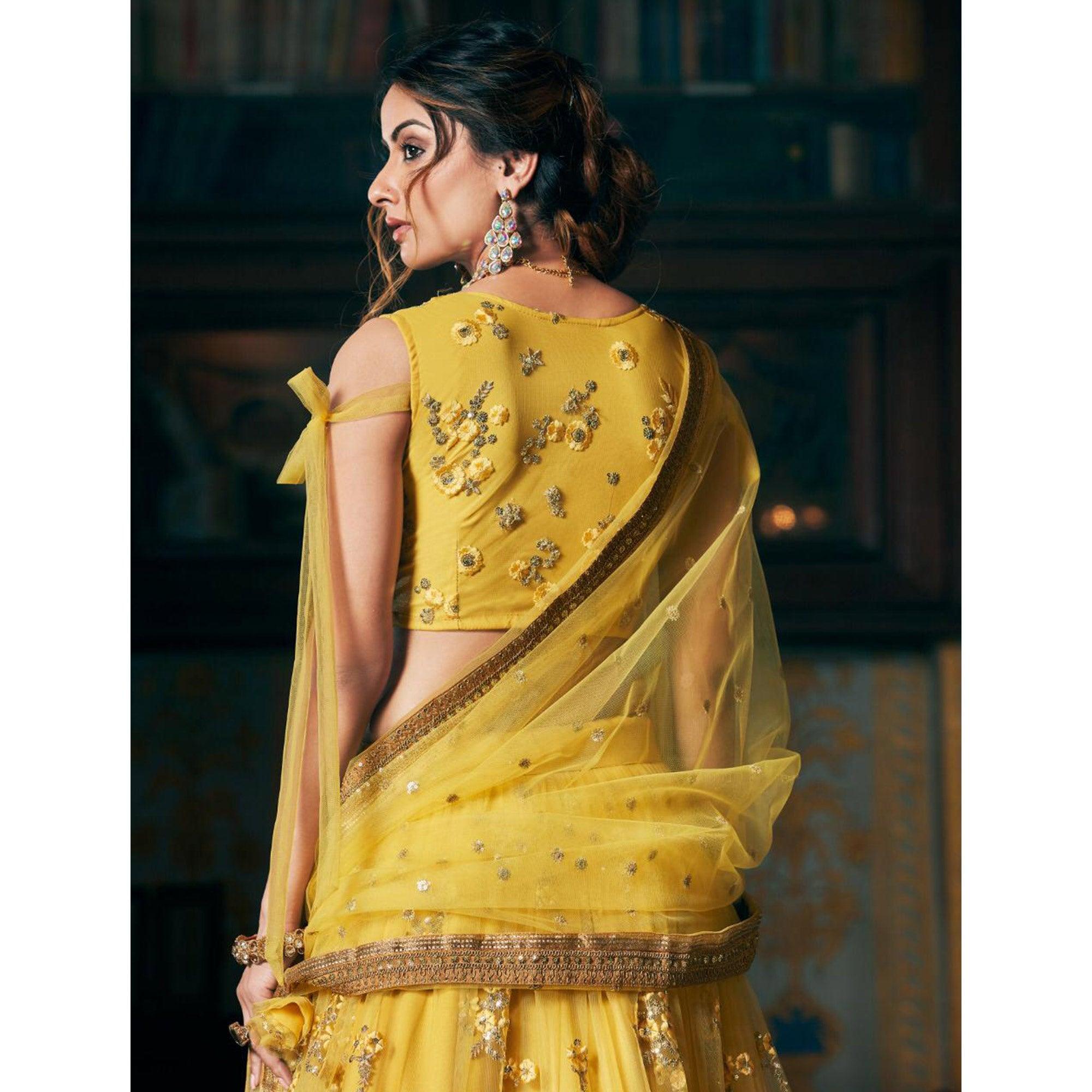 Yellow Wedding Wear Floral Embroidery With Sequence And Dori Work Net Lehenga Choli - Peachmode