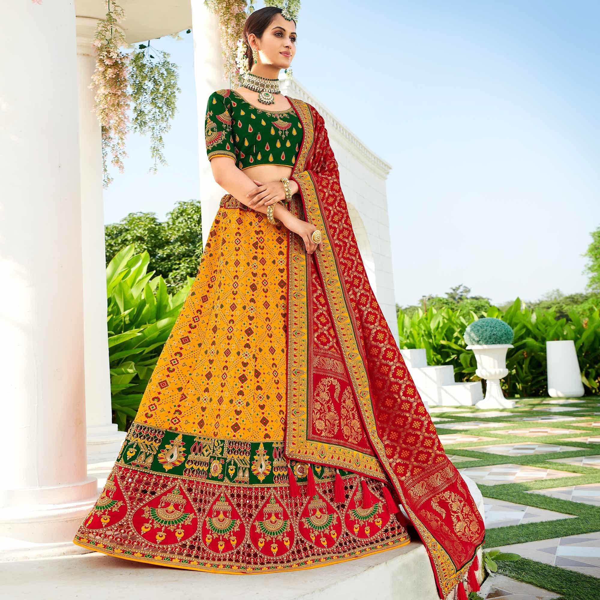Yellow Wedding Wear Heavy Embroidered Banarasi Silk Lehenga Choli - Peachmode