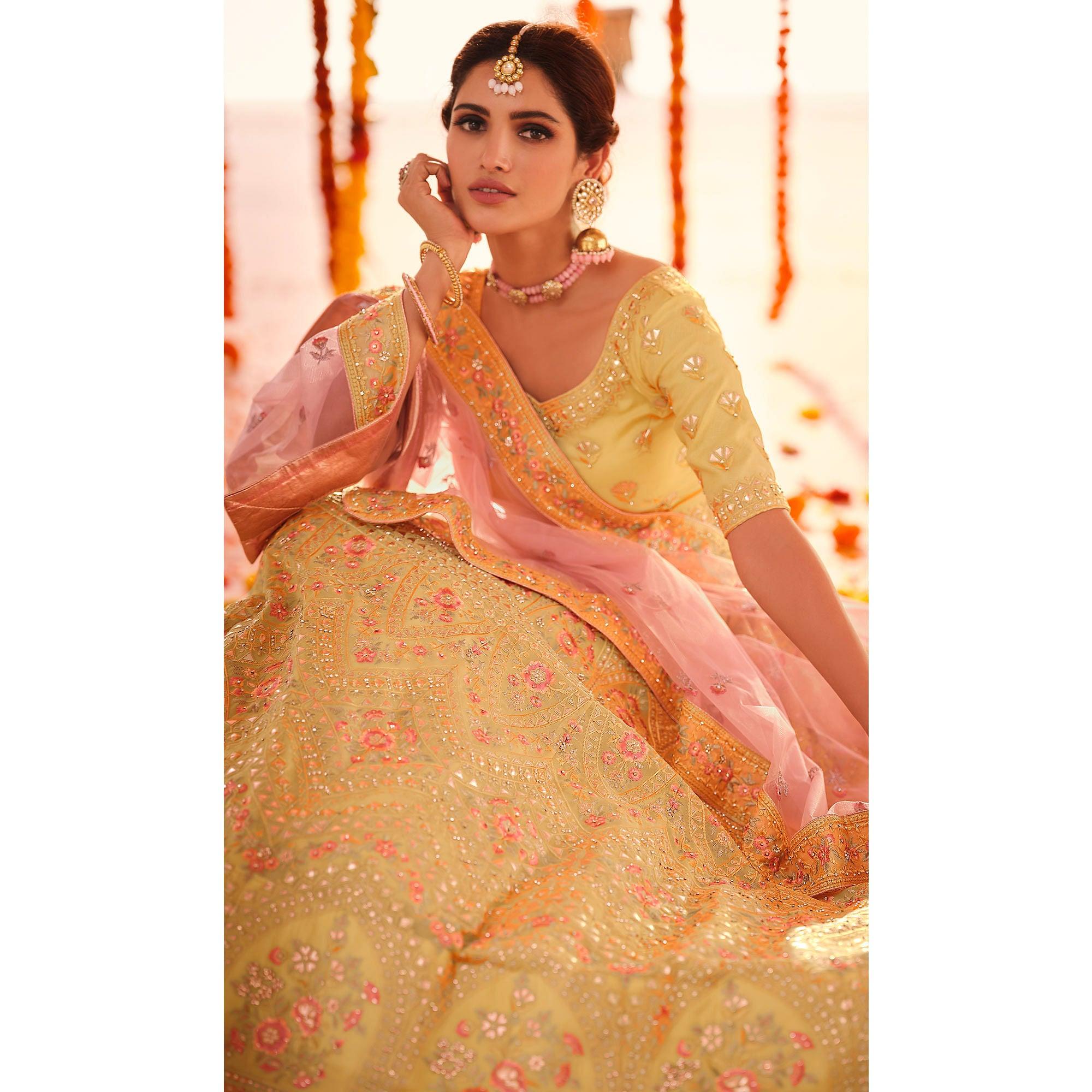 Yellow Wedding Wear Heavy Embroidered Organza Lehenga Choli - Peachmode