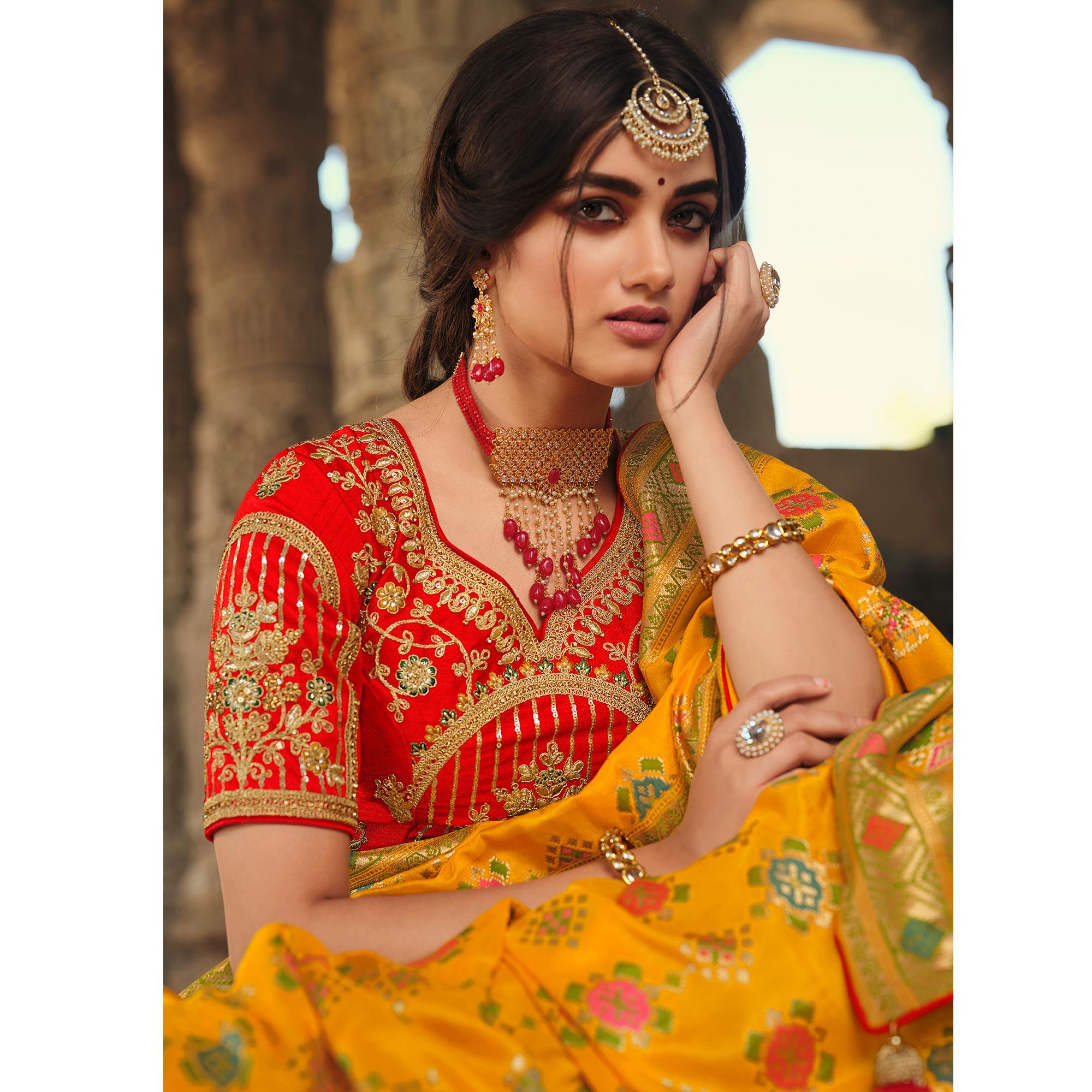 Yellow Wedding Wear Woven Silk Saree With Tassels - Peachmode