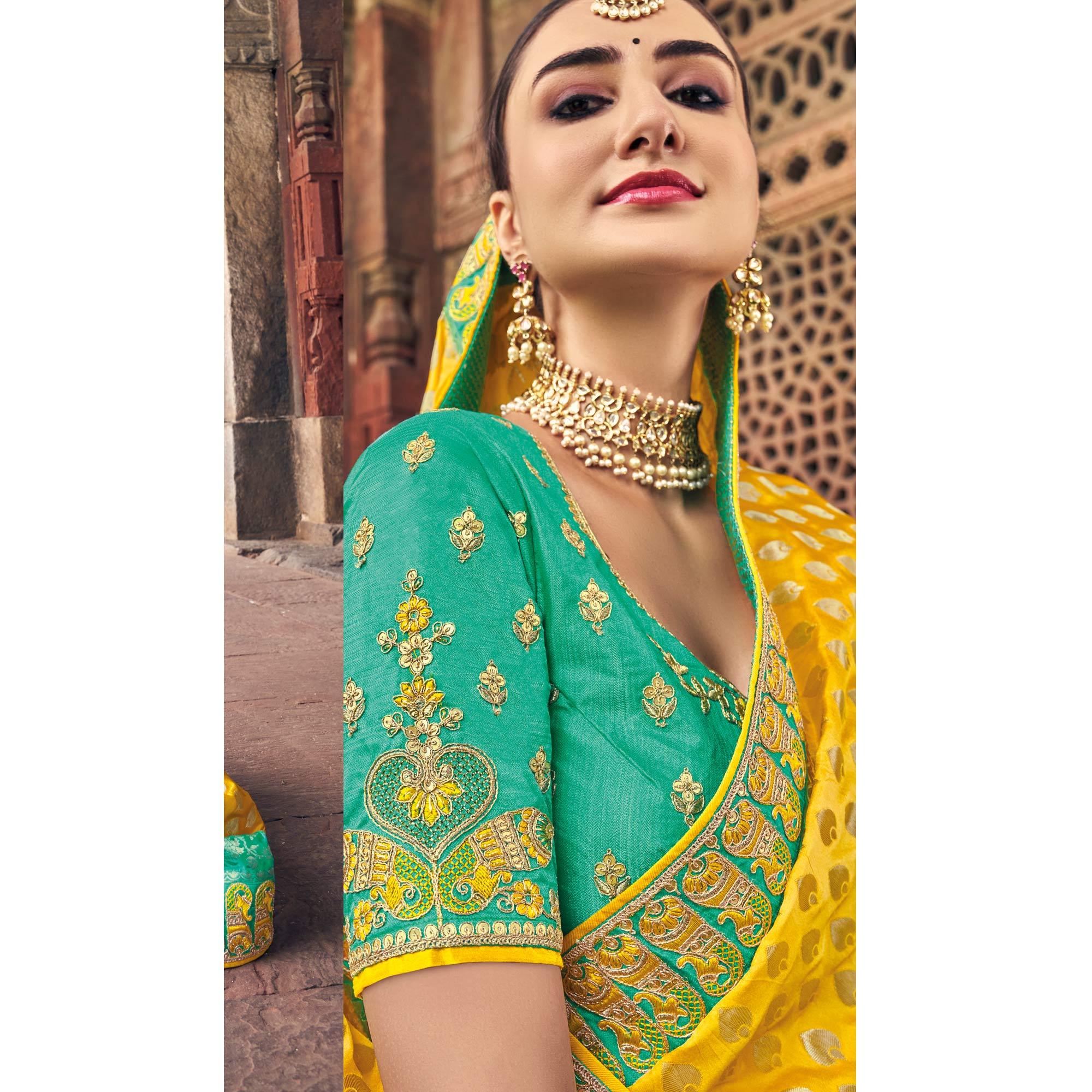 Yellow Woven Banarasi Silk Saree With Tassels - Peachmode