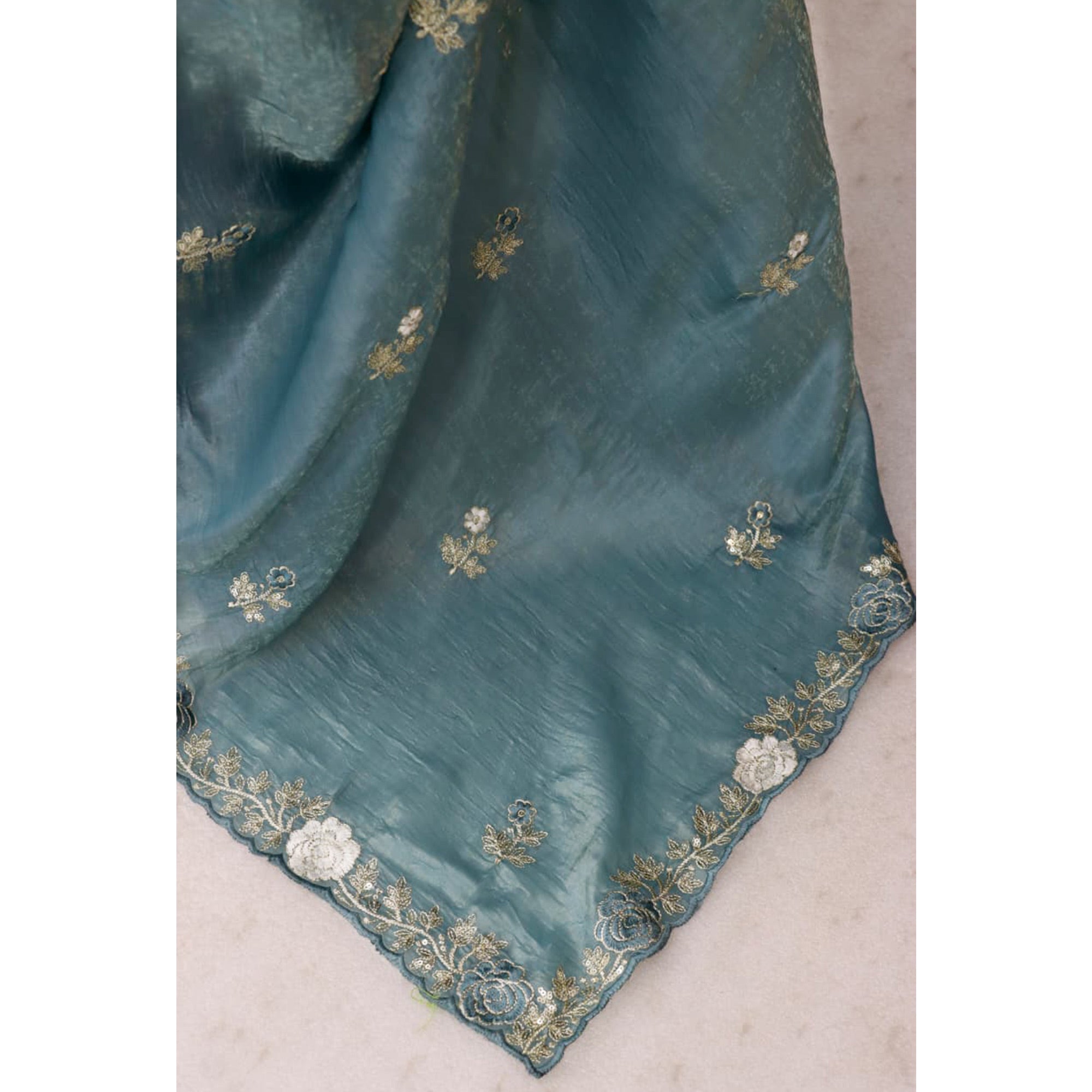 Blue Lightweight Georgette Crush Saree Adorned with Delicate Floral Embroidery