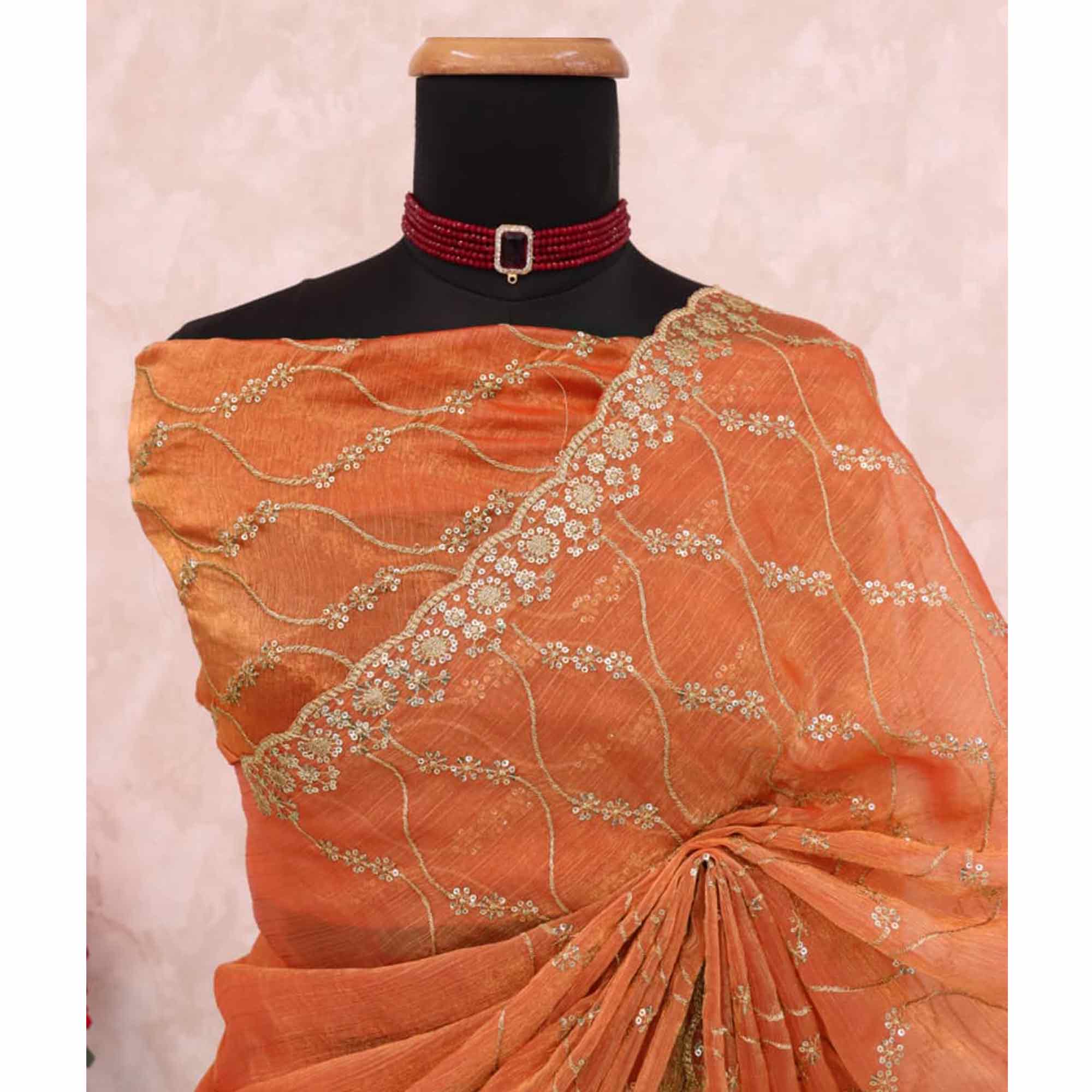 Orange Partywear Organza Chiffon Silk Saree Highlighted with Fine Sequins Detailing
