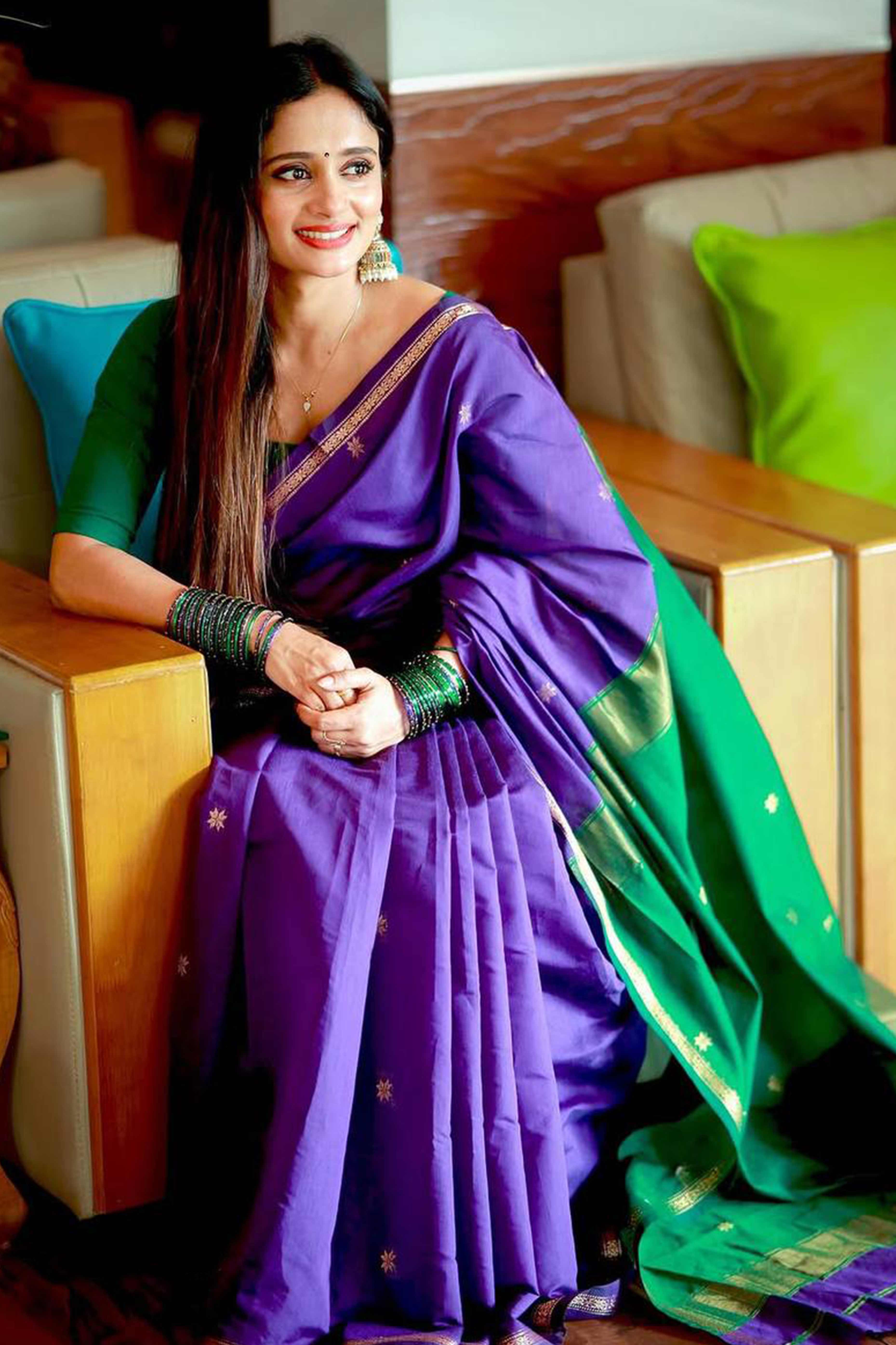 Purple Linen Cotton Saree Adorned with Intricate Zari Butti Weaving for a Refined Ethnic Appeal