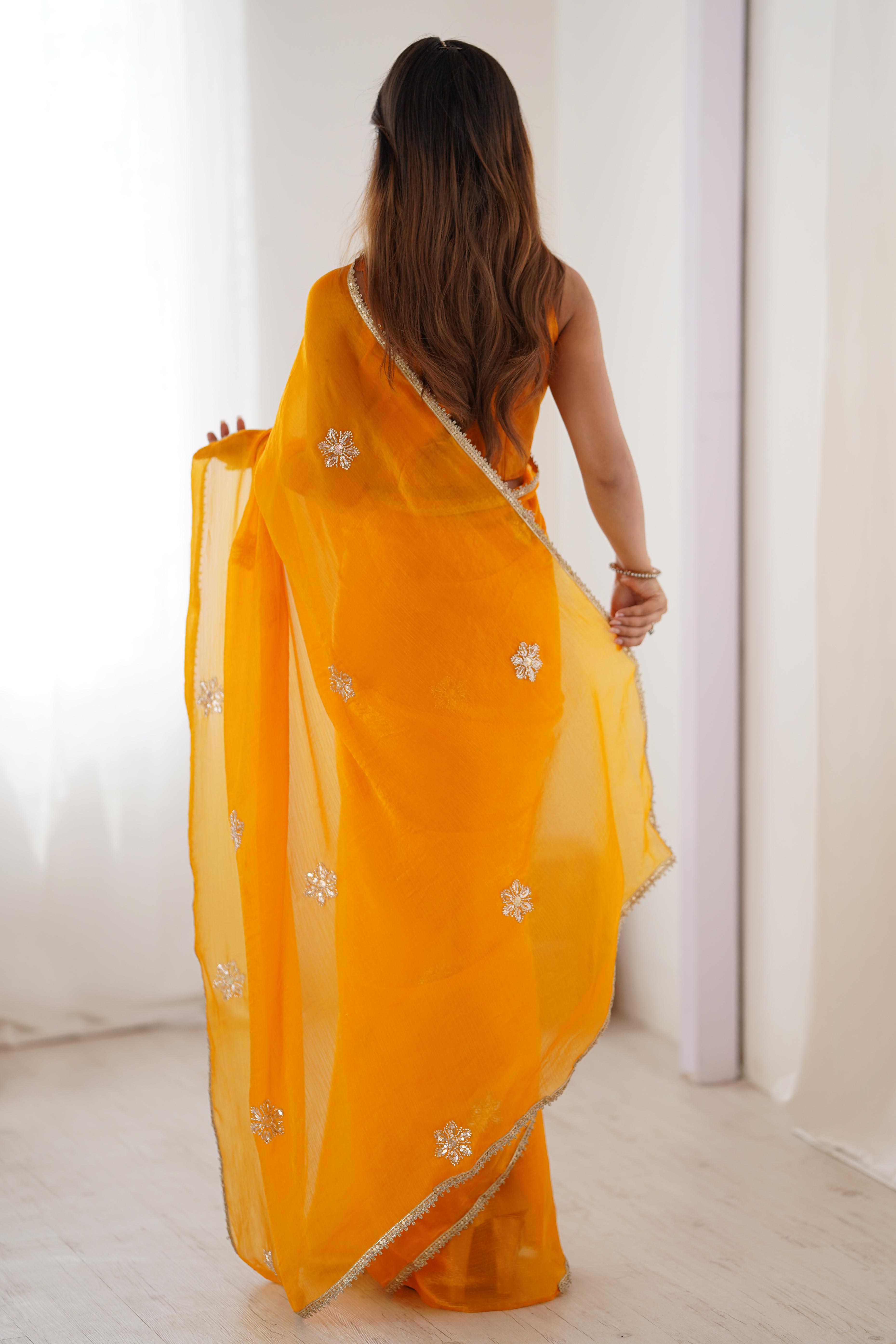 Mustard Yellow Organza Saree Embellished with Intricate Floral Work and Elegant Lace Detailing