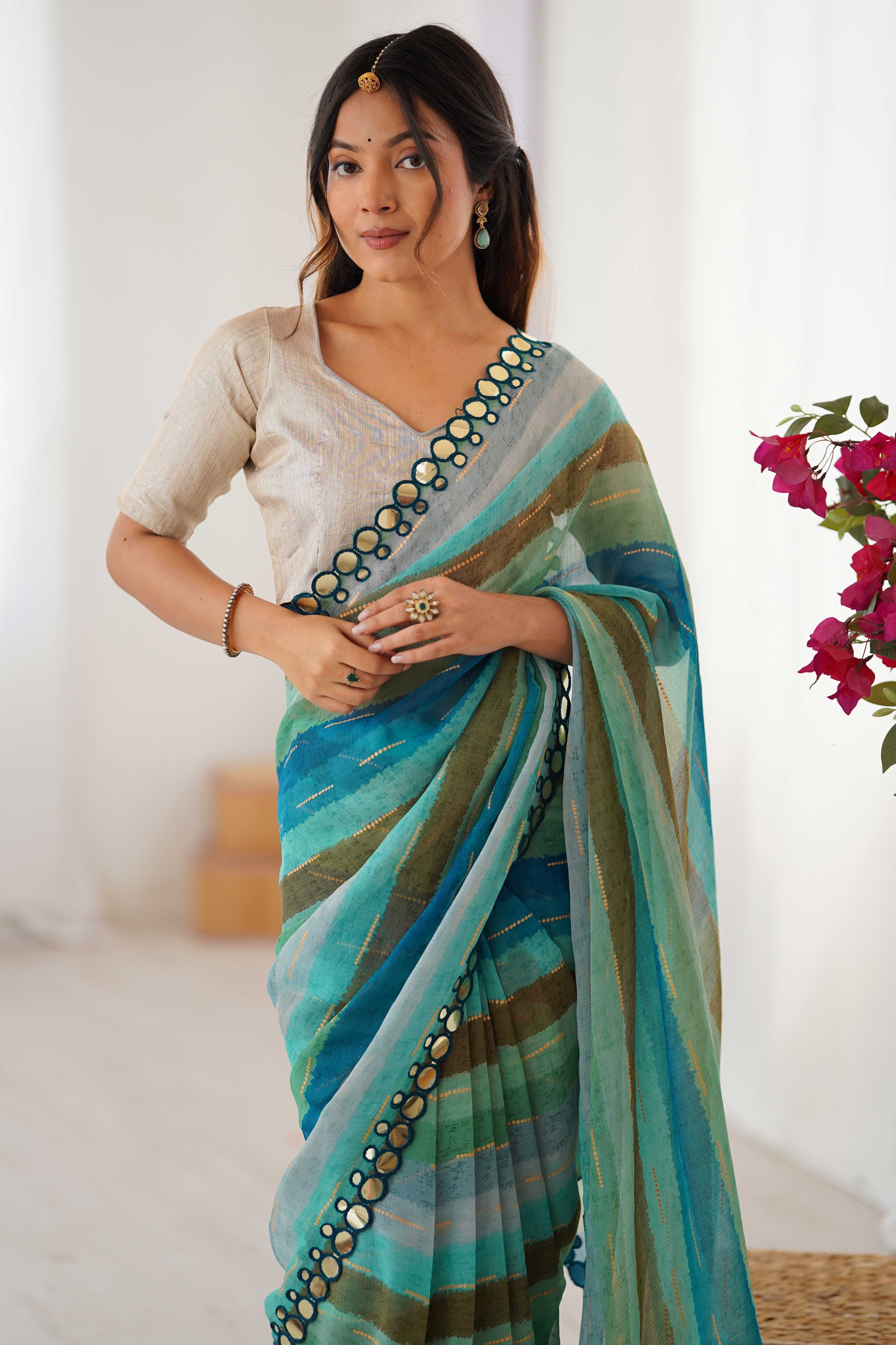 Soft Chiffon Turquoise Saree Featuring Classic Leheriya and Mirror Work Edges