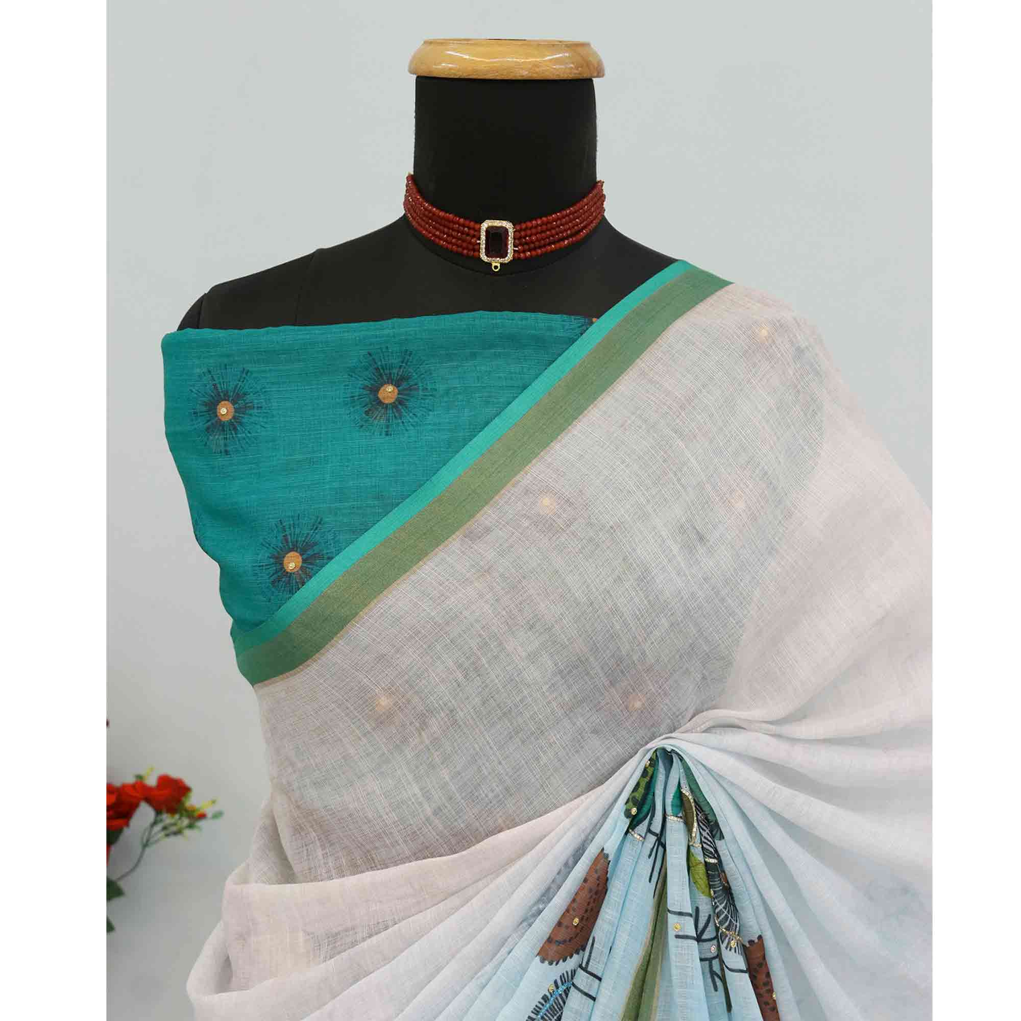 Sky Blue Pure Soft Linen Saree with Elegant Prints and Delicate Stone Work Embellishment