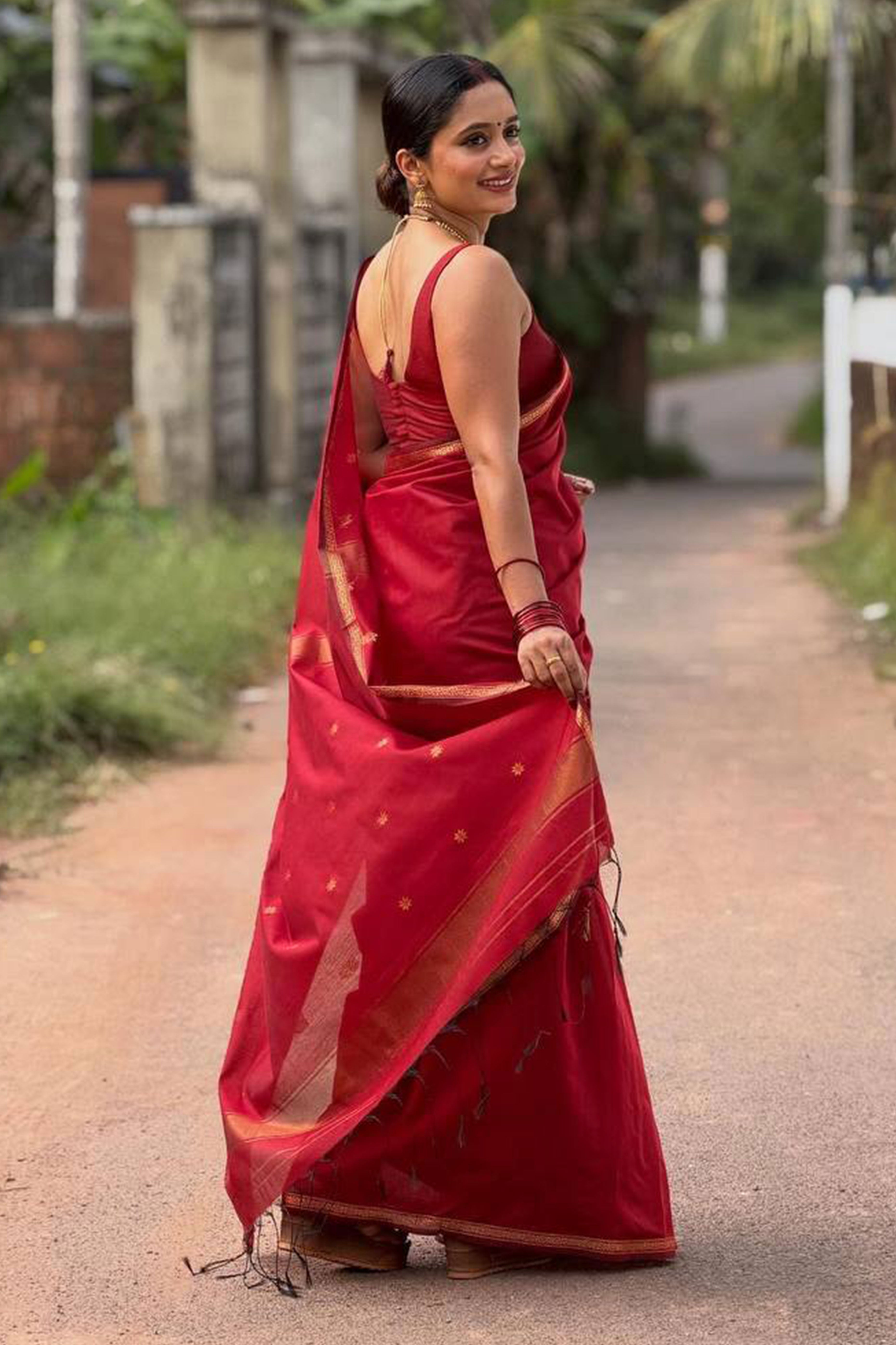 Maroon Classic Linen Cotton Saree Enhanced with Fine Zari Butti Weaving Detailing