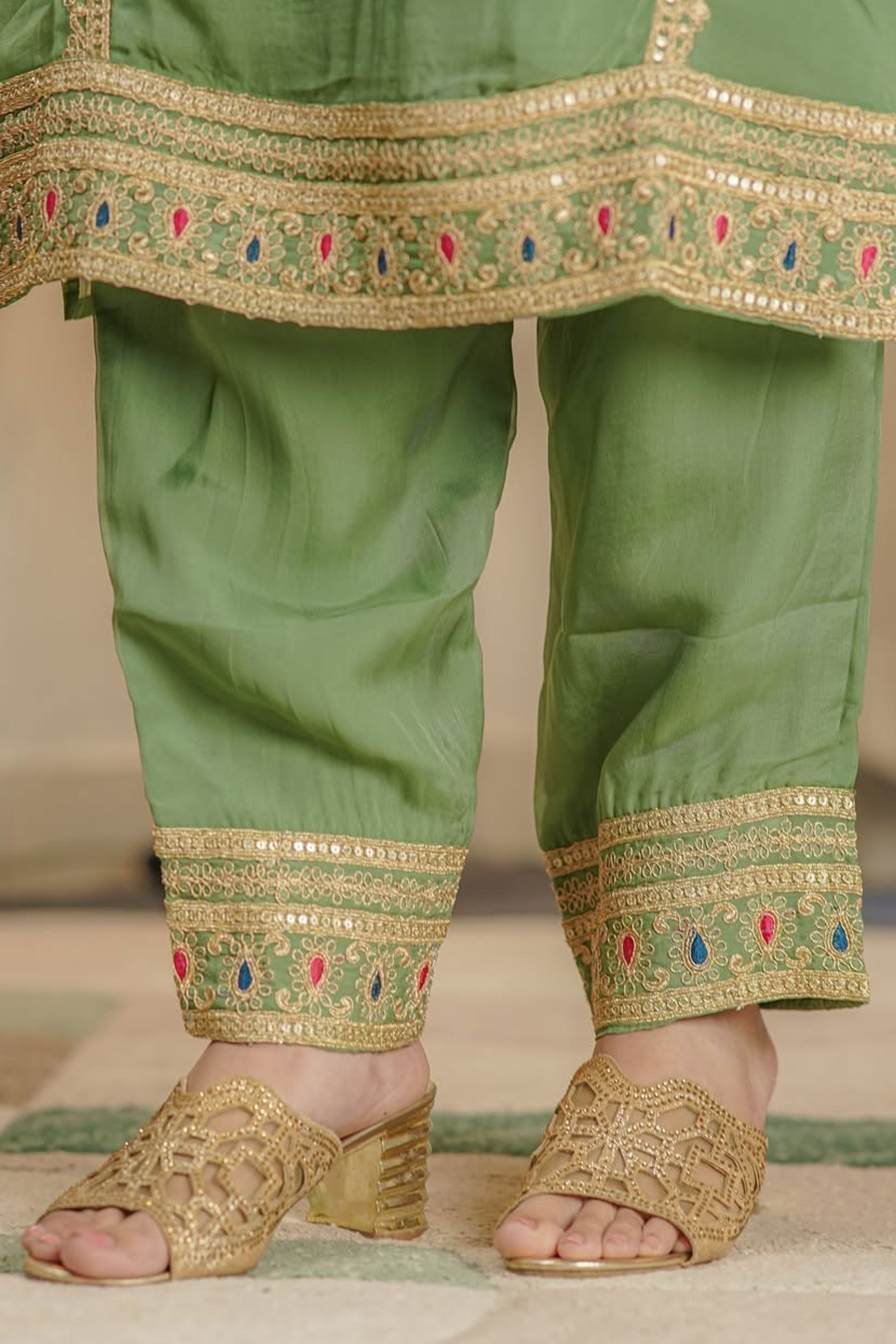 Green Organza Suit Accented with Thread & Sequins Work