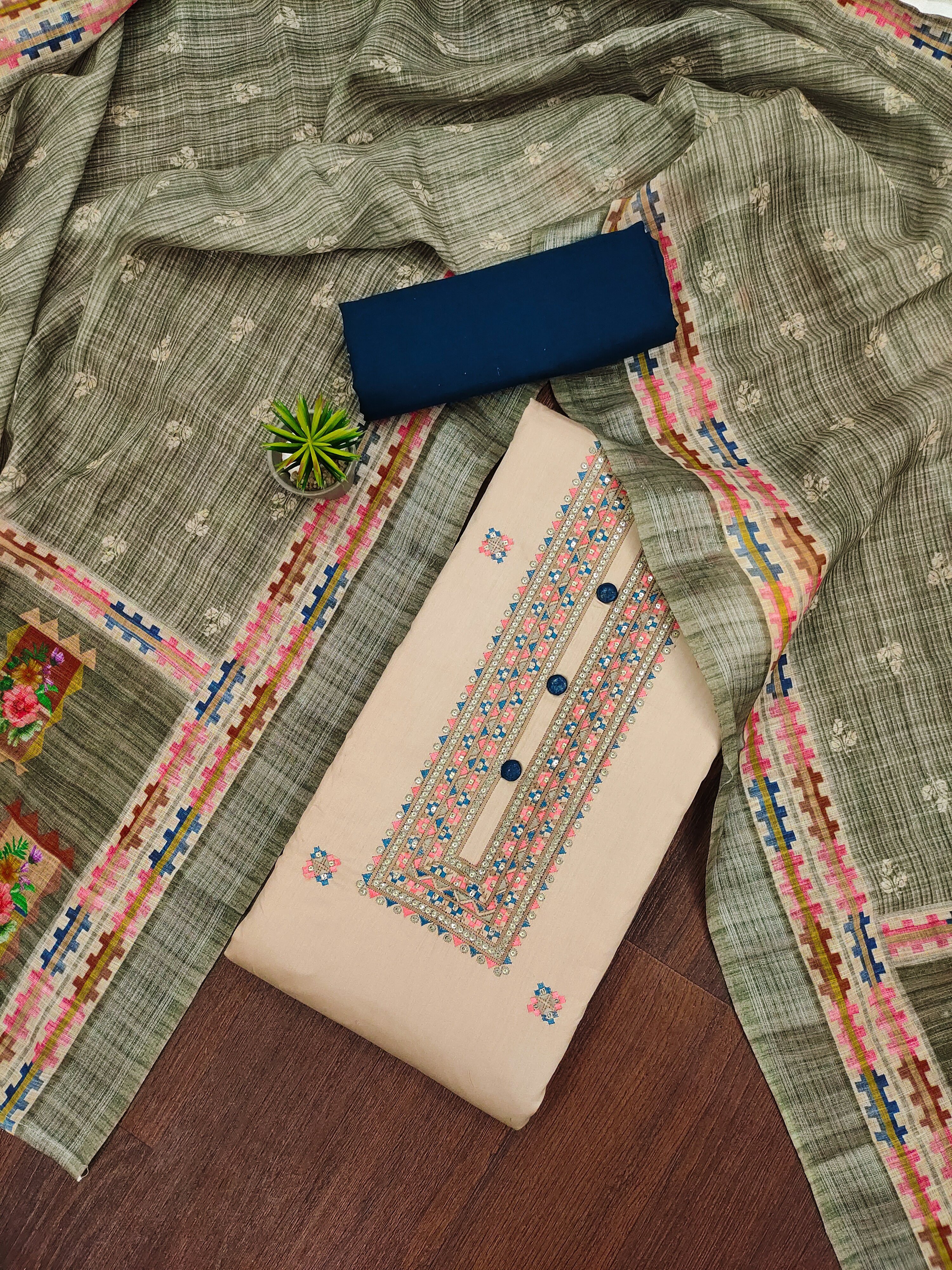 Chikoo Sequins Embroidered Pure Cotton Dress Material