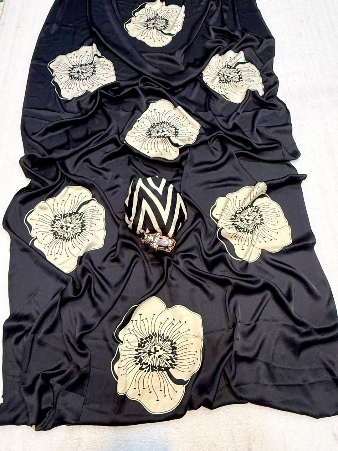 Timeless elegance in this black satin saree adorned with delicate floral prints - Image 3