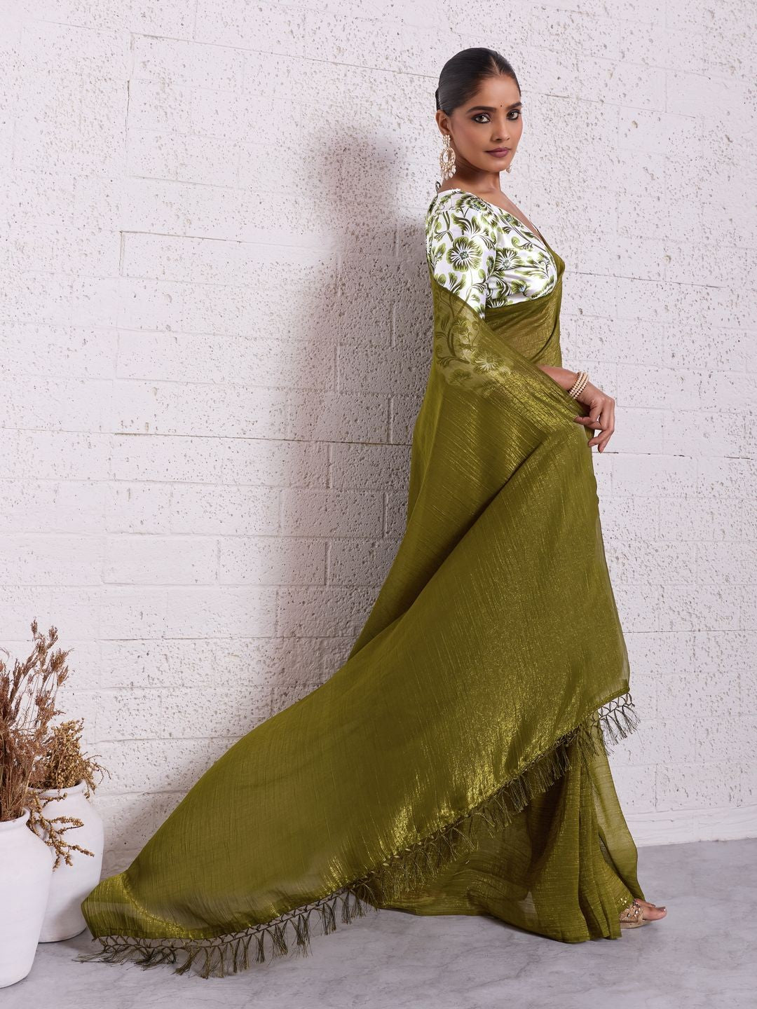 Graceful Mehendi Green Solid Pure Crunchy Saree Accented With Fine Tassel Pallu - Image 2