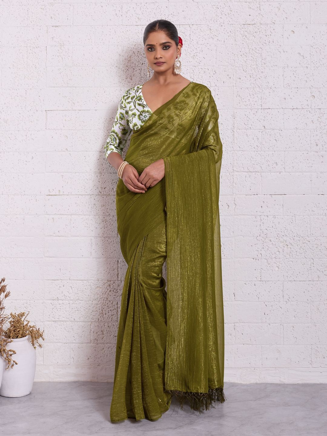 Graceful Mehendi Green Solid Pure Crunchy Saree Accented With Fine Tassel Pallu - Image 1