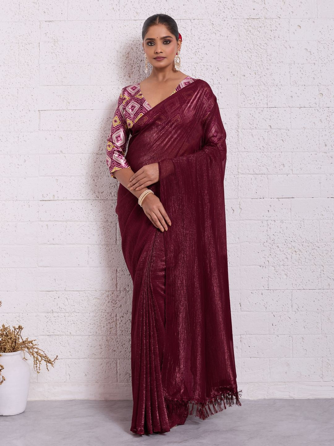 Graceful Dark Maroon Solid Pure Crunchy Saree Accented With Fine Tassel Pallu - Image 1