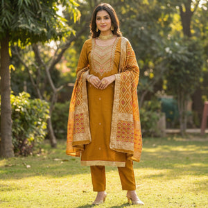 Graceful Mustard Cotton Silk Dress Material With Floral Cording Embroidery & Sparkling Sequins - Image 1