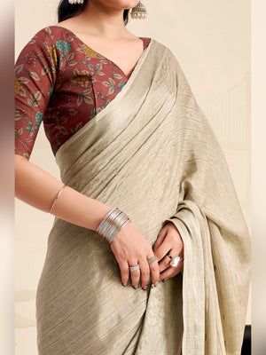 Refreshing Chikoo Floral Weaving Chinon Jacquard Saree With Artful Tassel Pallu Accent - Image 2