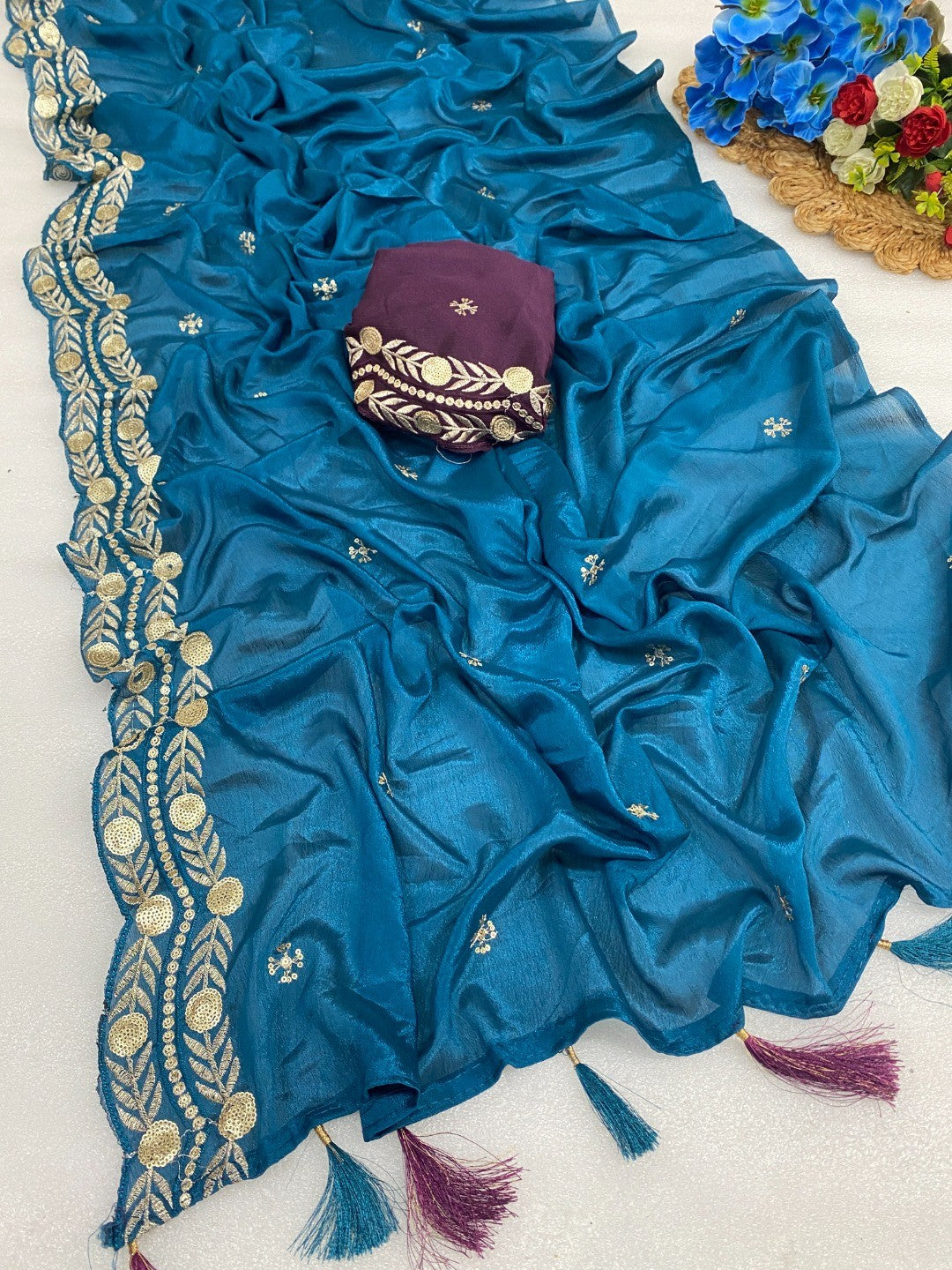 Charming Blue Georgette Saree Enhanced With Intricate Floral Sequins Embroidery - Image 1