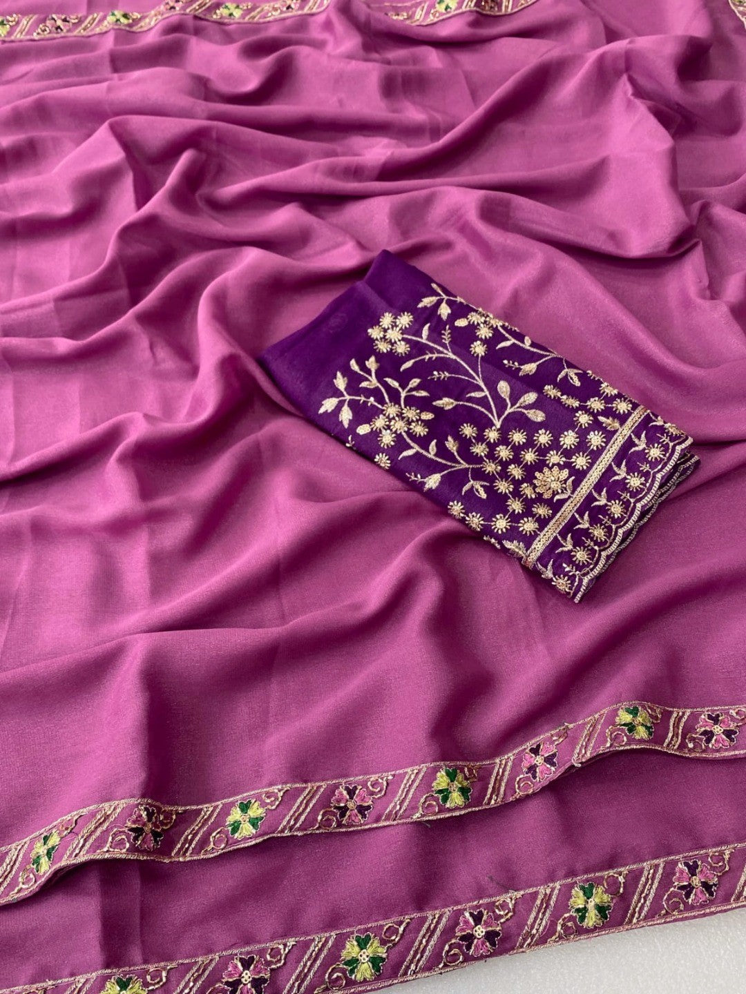 Timeless Onion Pink Solid Georgette Saree Finished With Graceful Floral Hand Embroidered Lace Border - Image 4