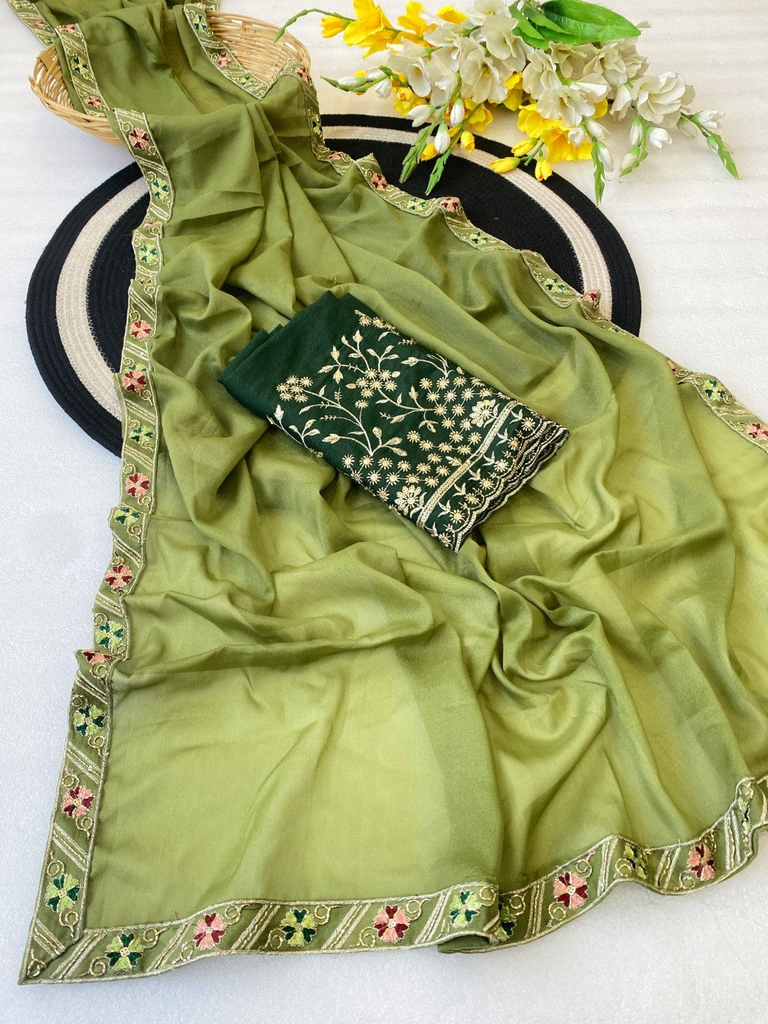 Timeless Green Solid Georgette Saree Finished With Graceful Floral Hand Embroidered Lace Border - Image 2