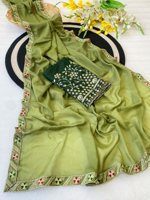 Timeless Green Solid Georgette Saree Finished With Graceful Floral Hand Embroidered Lace Border - Image 2