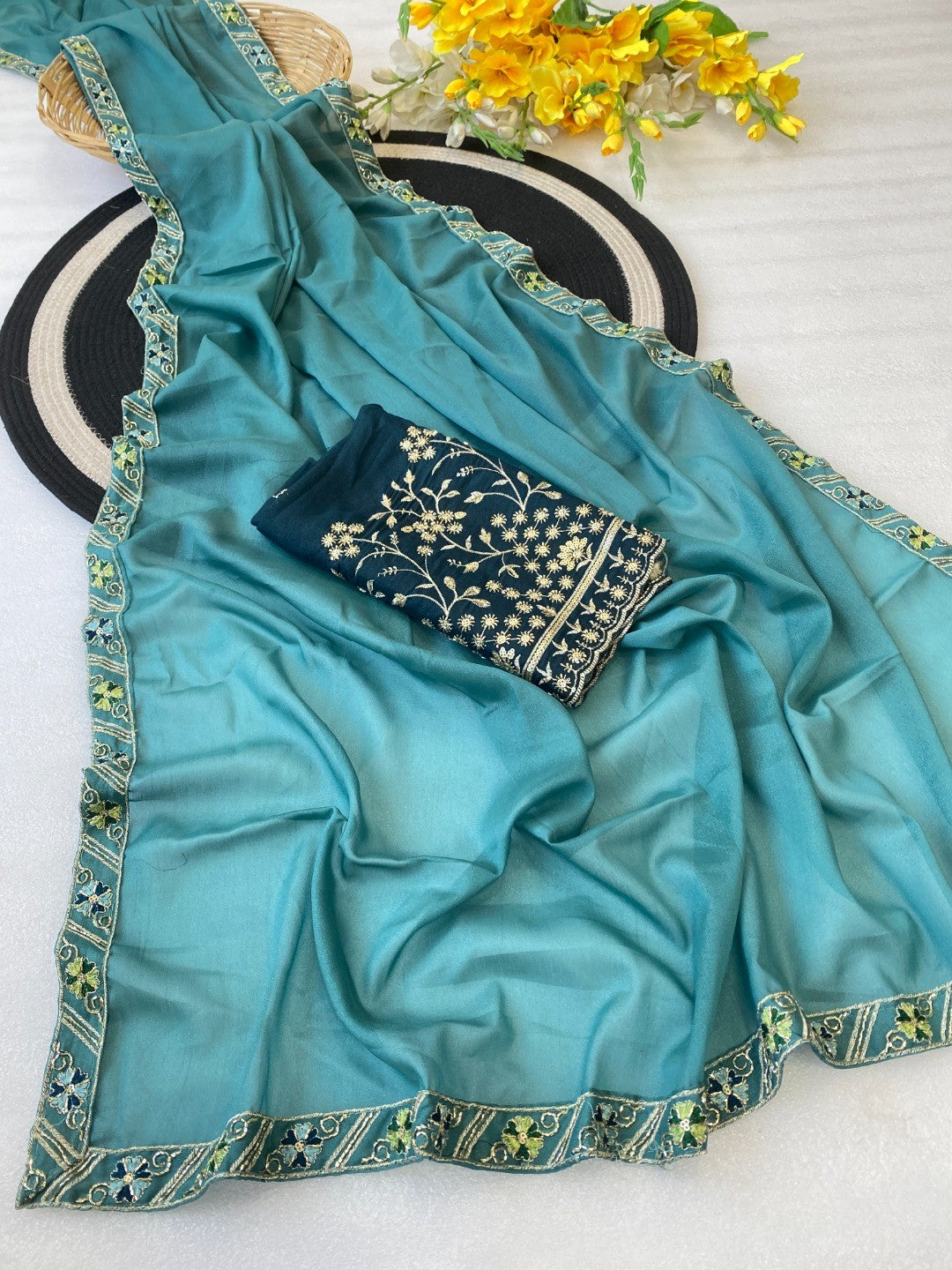 Timeless Blue Solid Georgette Saree Finished With Graceful Floral Hand Embroidered Lace Border - Image 2