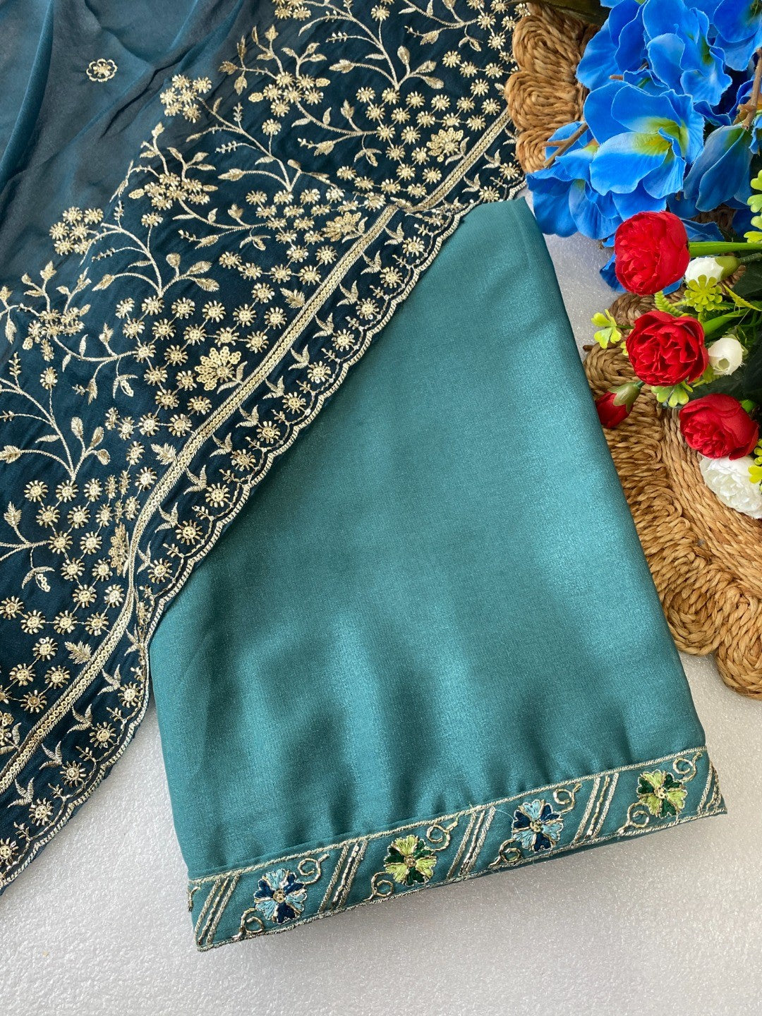 Timeless Blue Solid Georgette Saree Finished With Graceful Floral Hand Embroidered Lace Border - Image 3