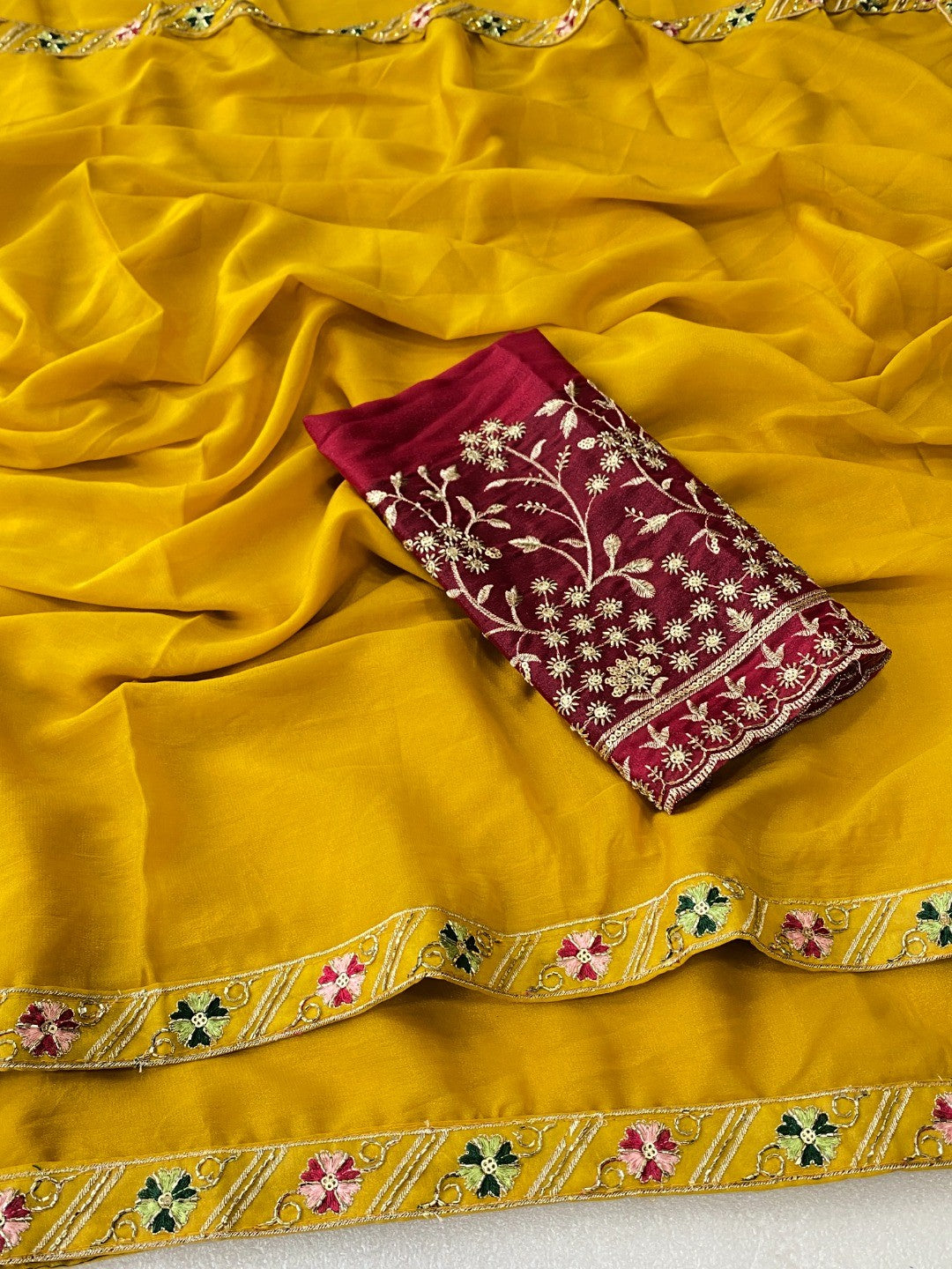 Timeless Yellow Solid Georgette Saree Finished With Graceful Floral Hand Embroidered Lace Border - Image 4