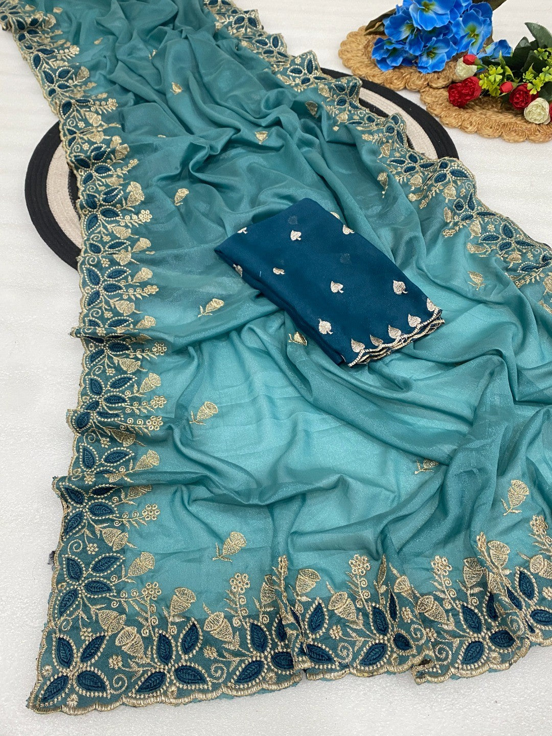 Vibrant Blue Georgette Saree Adorned With Elegant Floral Embroidery Work - Image 2