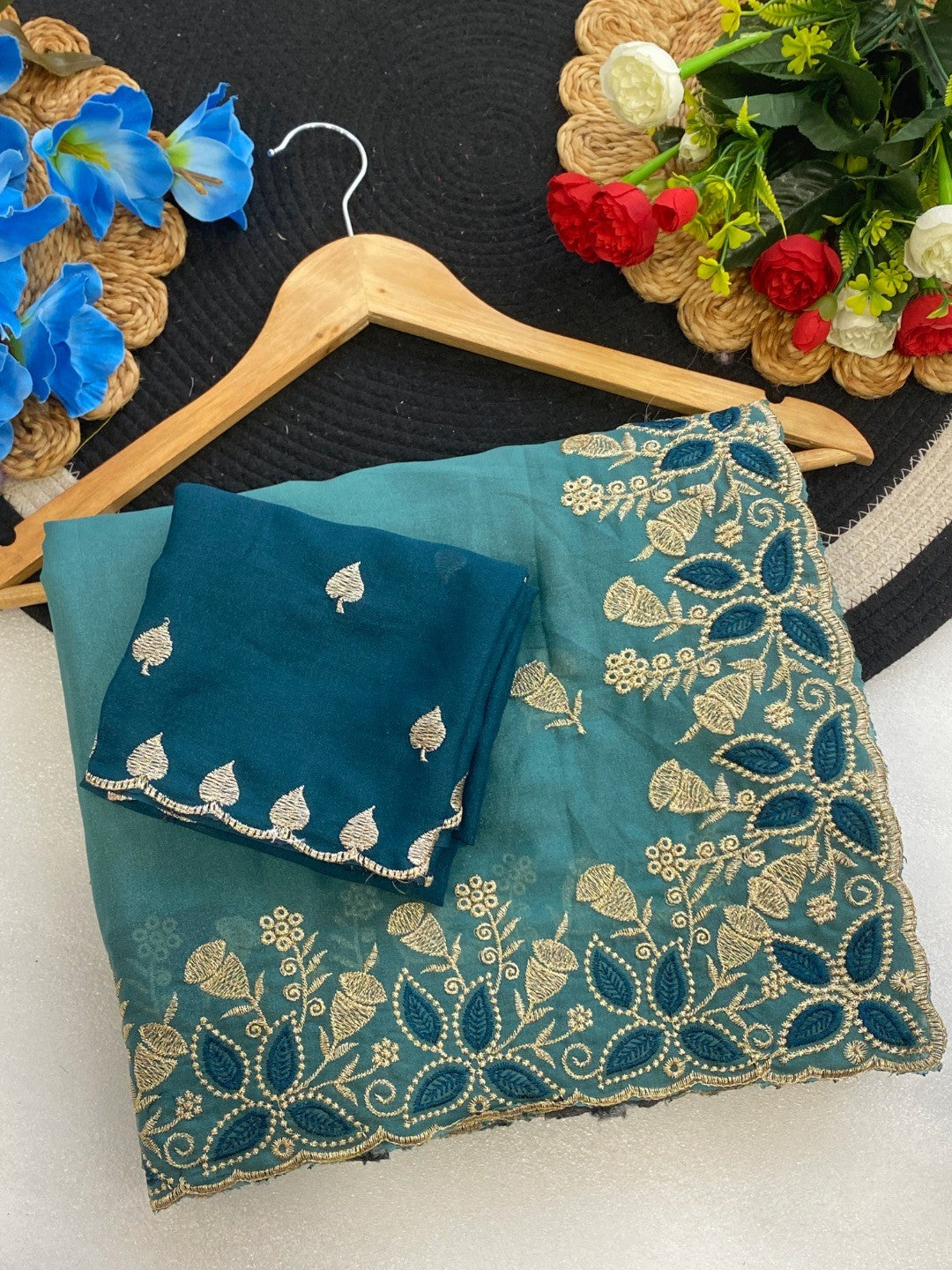 Vibrant Blue Georgette Saree Adorned With Elegant Floral Embroidery Work - Image 3