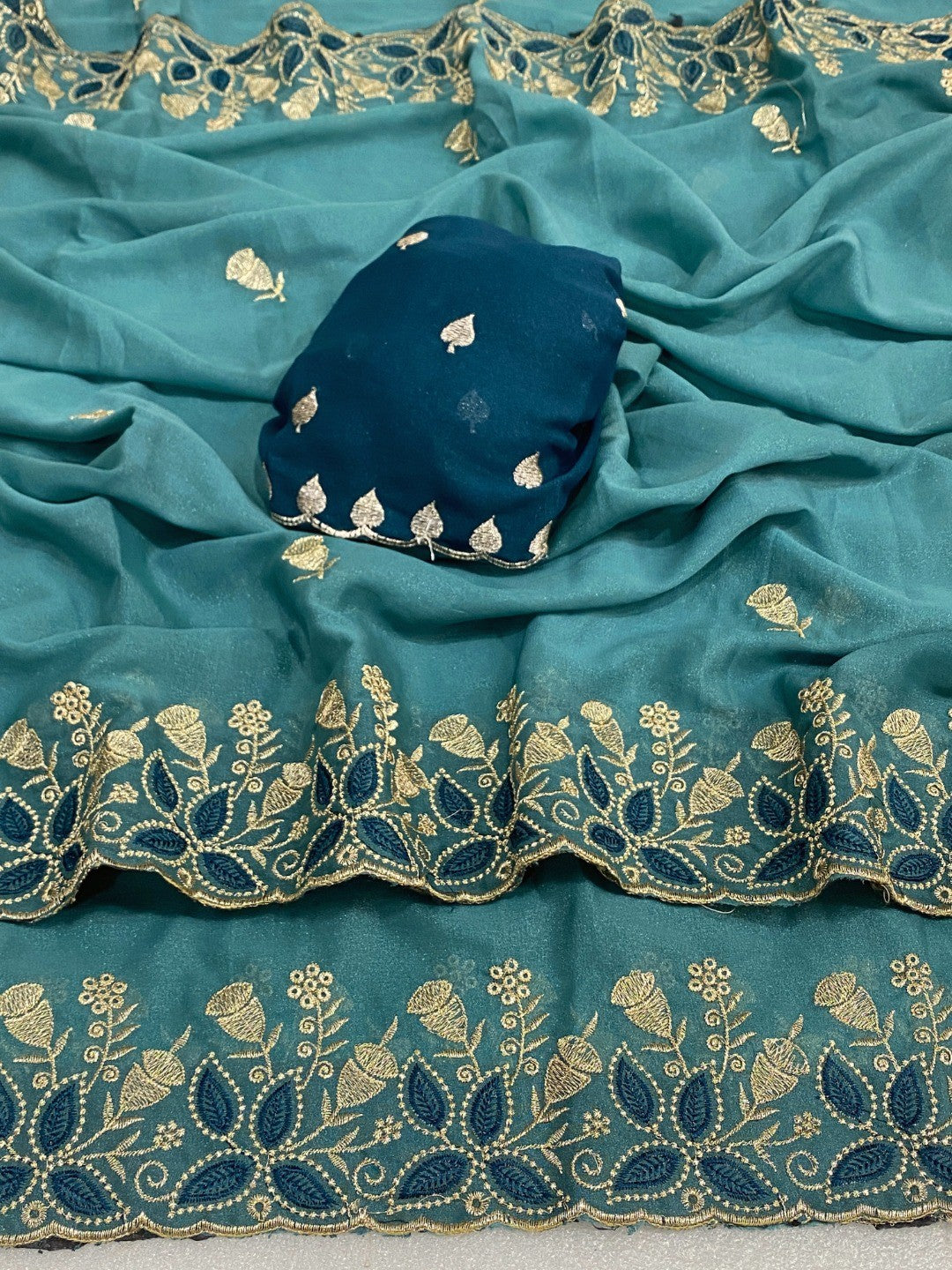 Vibrant Blue Georgette Saree Adorned With Elegant Floral Embroidery Work - Image 4