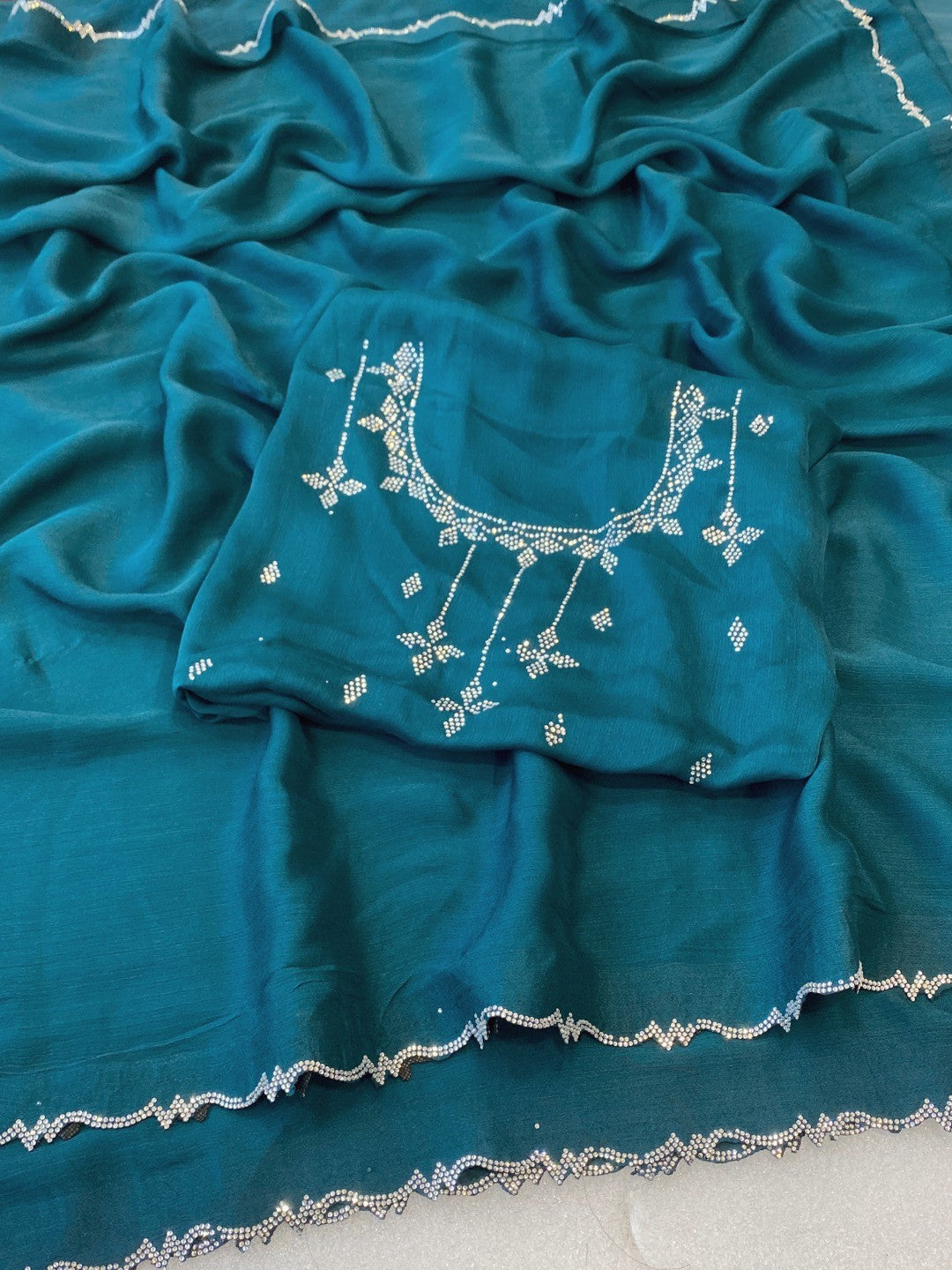 Classic Peacock Blue Solid Chiffon Saree Featuring Subtle Stone Work Border Detailing - Image 4