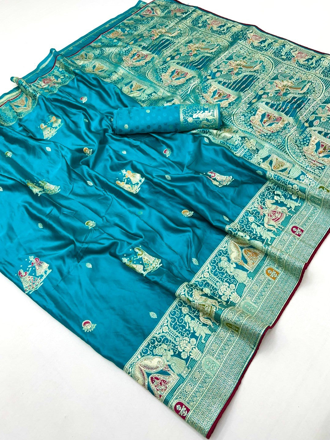 Rich Peacock Blue Satin Saree Adorned With Intricate Weaving Accents & Sparkling Stone Work Elegance - Image 2