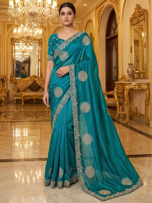 Elegant Teal Blue Organza Satin Silk Saree Adorned With Fine Embroidery & Swarovski Work - Image 1