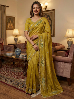 Luxurious Dark Mustard Floral Sequins Embroidered Moss Georgette Saree Accented With Zari Border - Image 1