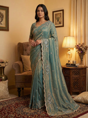 Luxurious Blue Floral Sequins Embroidered Moss Georgette Saree Accented With Zari Border - Image 1