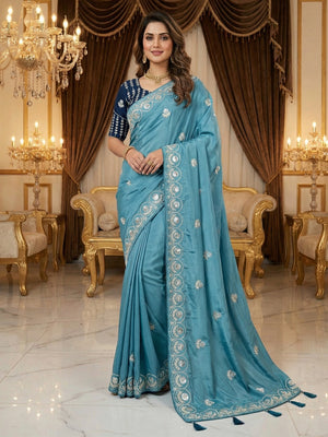 Luxurious Blue Crepe Saree Featuring Floral Sequins Embroidery & Designer Tassel Pallu - Image 1