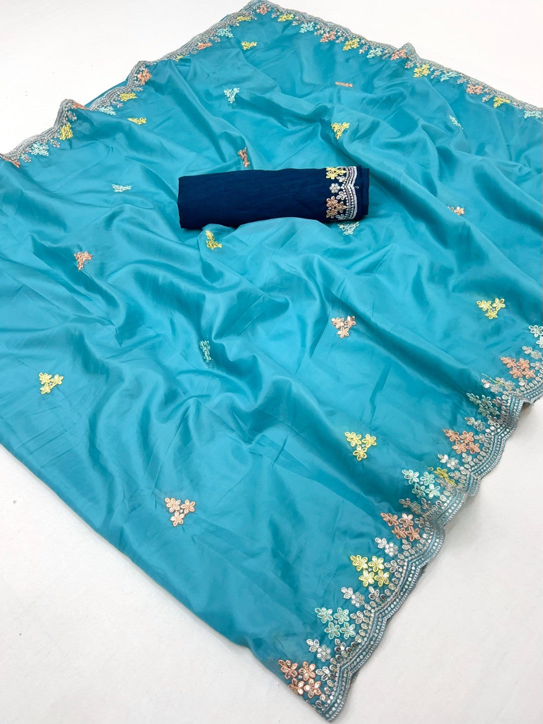 Elite Designer Blue Crystal Tissue Saree Showcasing Floral Embroidery & Sequins Detailing - Image 3