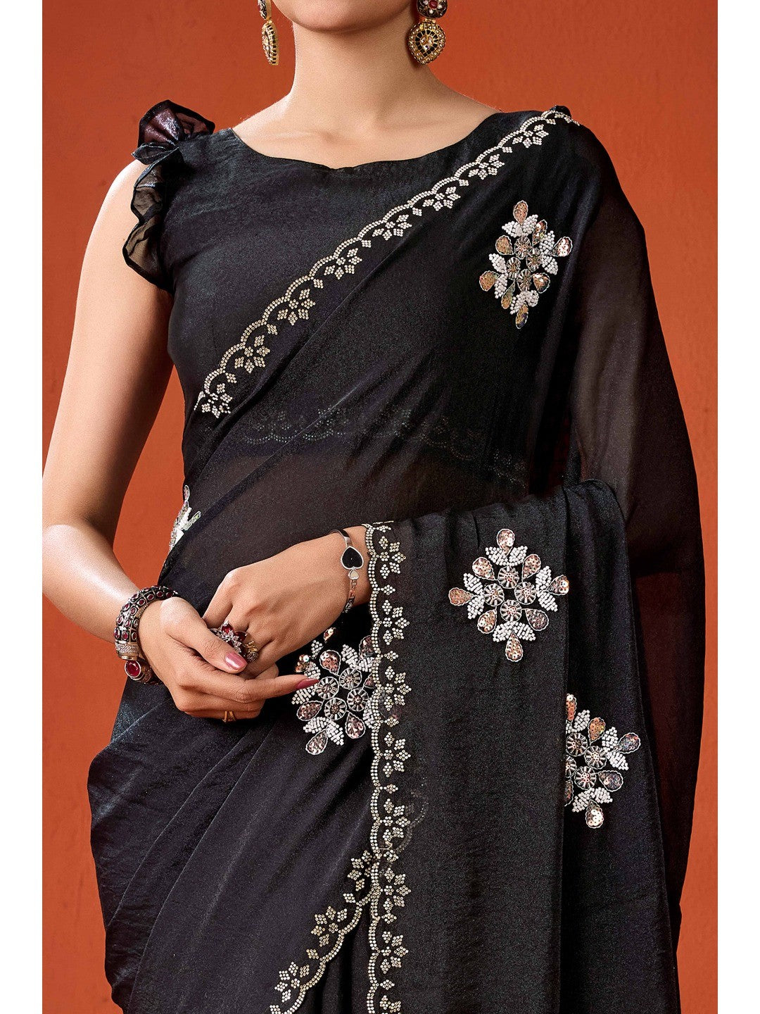 Graceful Black Georgette Silk Saree Adorned with Floral Embellishments - Image 2