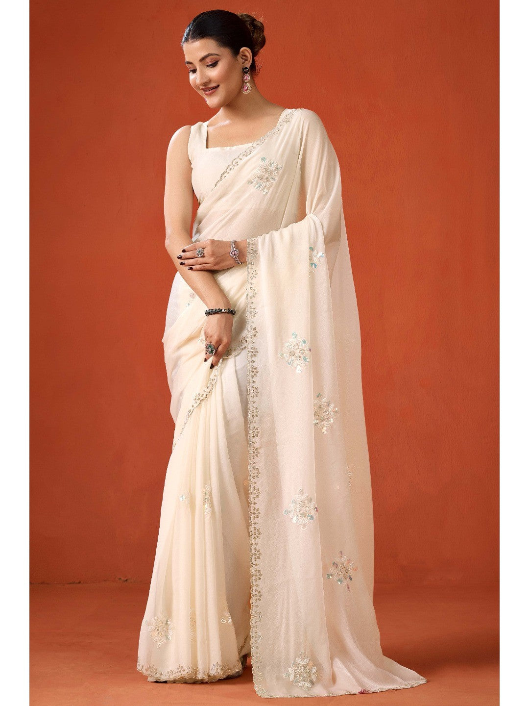 Graceful Offwhite Georgette Silk Saree Adorned with Floral Embellishments - Image 1