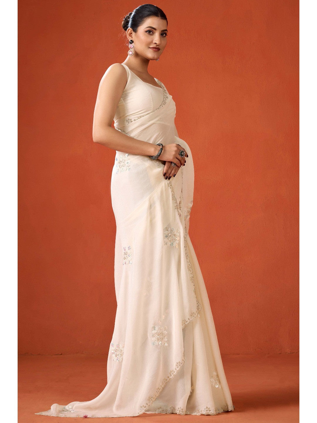 Graceful Offwhite Georgette Silk Saree Adorned with Floral Embellishments - Image 5