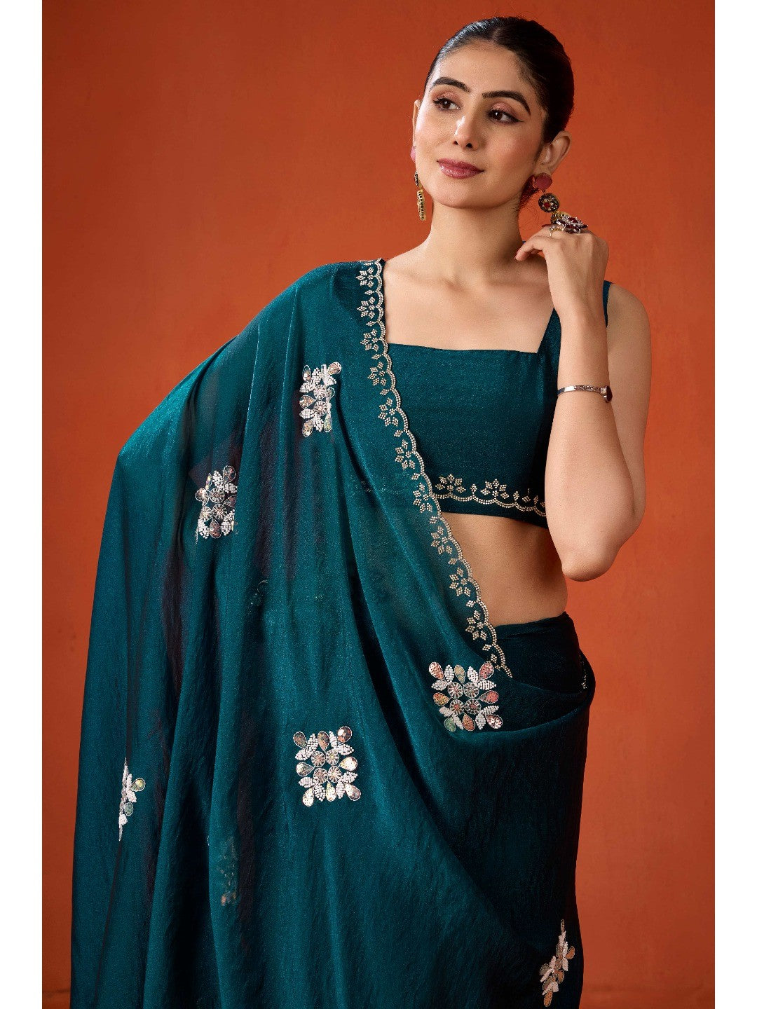 Graceful Teal Georgette Silk Saree Adorned with Floral Embellishments - Image 7