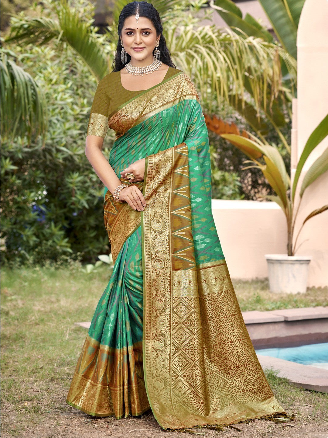 Elegant Rama Green Ikkat Print Woven Silk Blend Saree with Green Border - Image 1