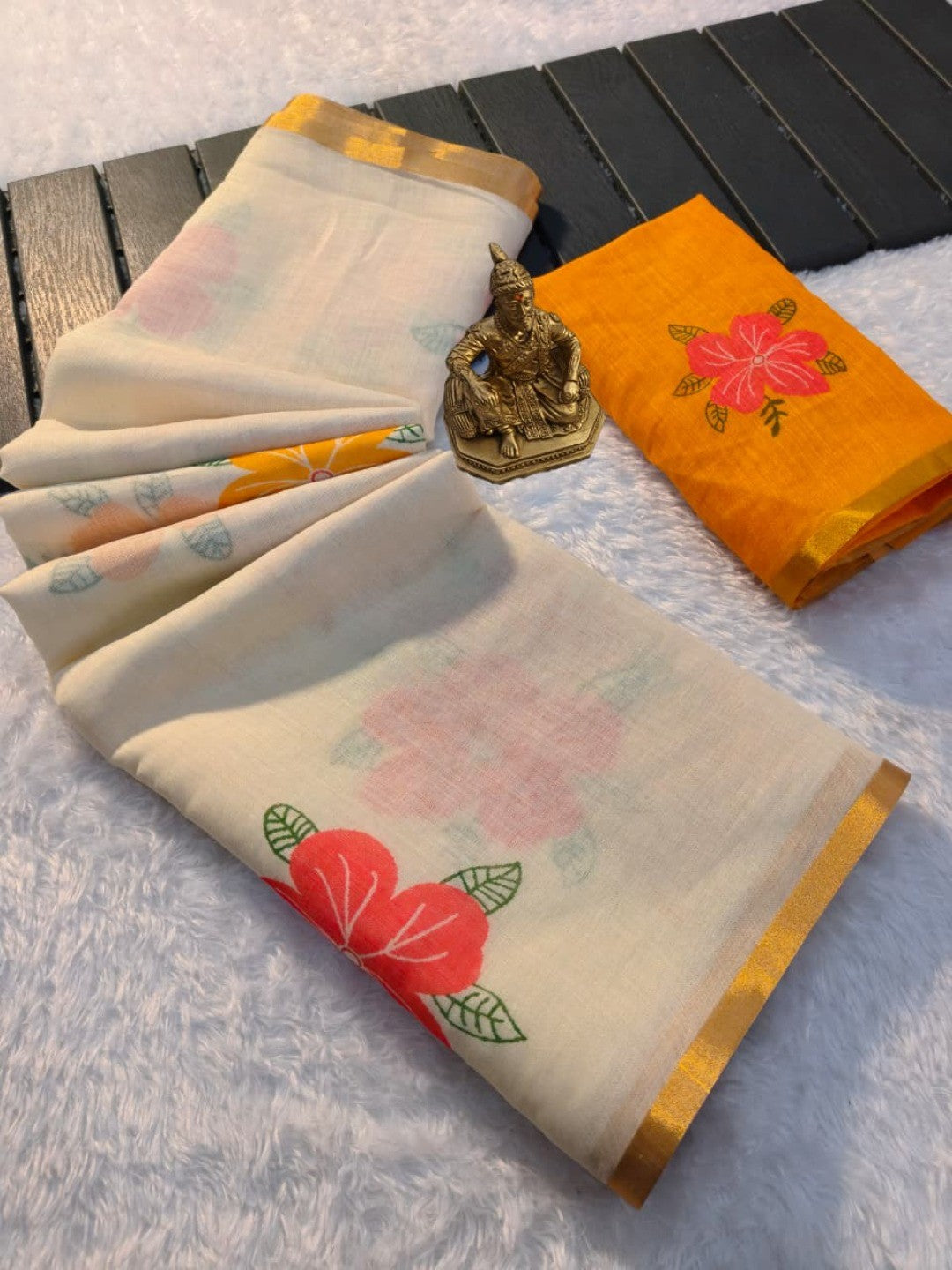 White Linen Cotton Saree Adorned with Vibrant Floral Prints and Breezy Texture - Image 2
