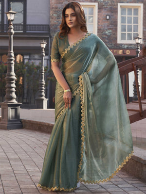 Sea Green Chiffon Saree with Flowing Drapes and a Delicate Handwoven Golden Zari Border - Image 1