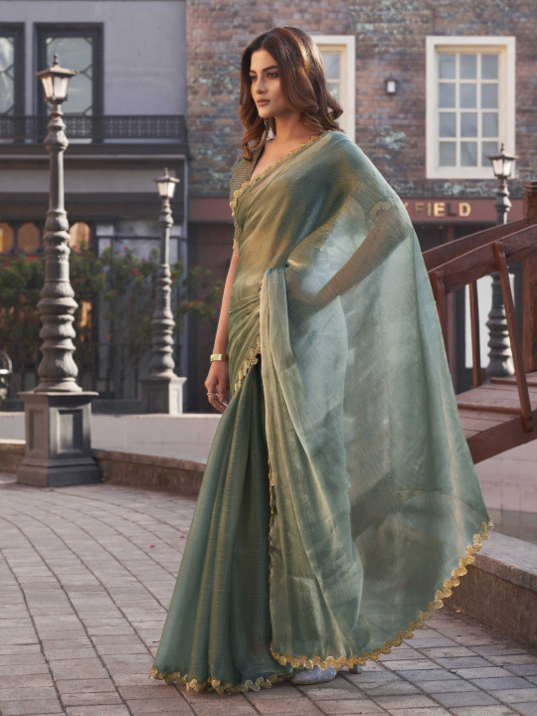 Sea Green Chiffon Saree with Flowing Drapes and a Delicate Handwoven Golden Zari Border - Image 5