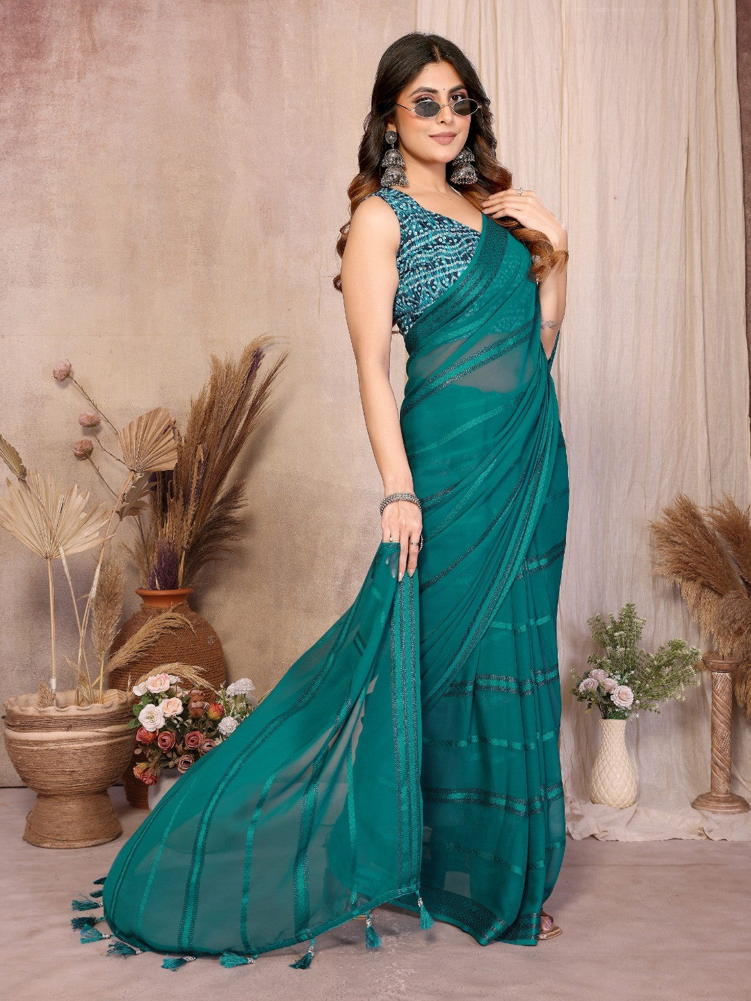 Elegant Teal Zari Striped Weaving Georgette Saree Highlighted With Tassel Pallu - Image 3