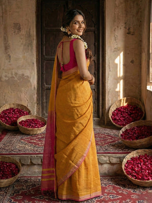 Elegant Mustard Solid Cotton Blend Saree Highlighted By Woven Border & Tassel Pallu - Image 2