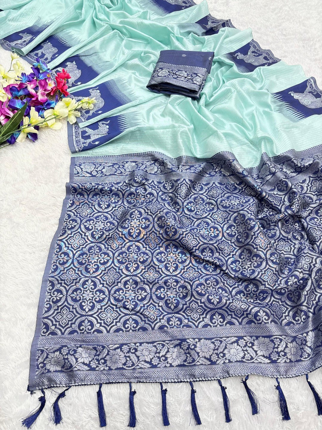 Mint Green Silk Blend Saree with Elephant Motif Border and Detailed Border Weaving - Image 1