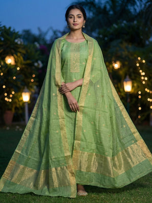 Green Chanderi Cotton Dress Material Featuring Detailed Woven Design - Image 1