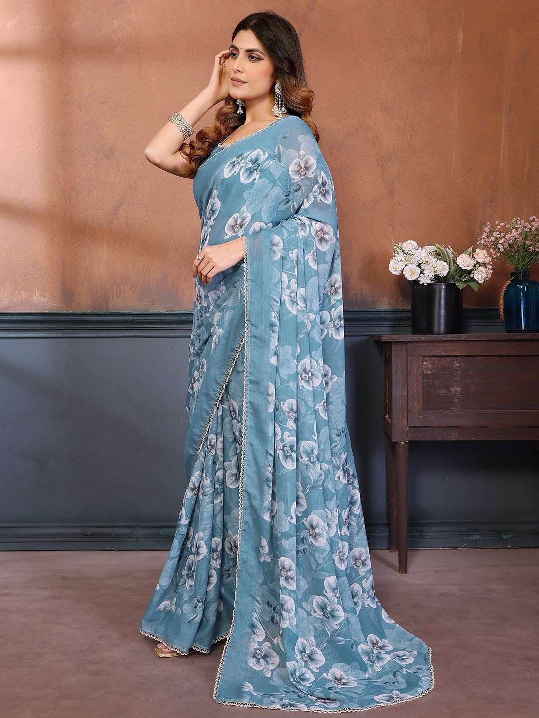 Elegant Sky Blue Floral Printed Georgette Saree Enhanced With Delicate Lace Border Work - Image 7